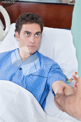 Image of Patient staring doctor