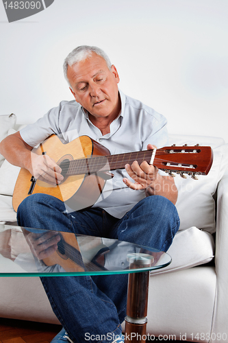 Image of Man Playing Guitar