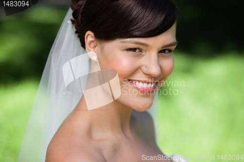 Image of Beautiful young bride smiling