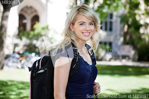 Image of Sweet smiling college girl