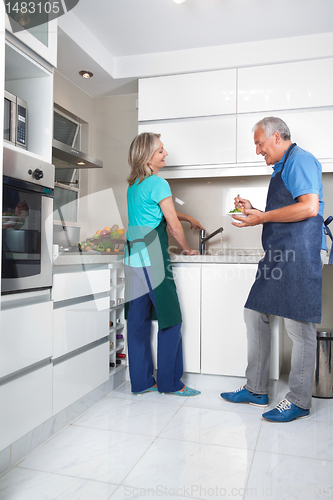 Image of Woman Working in Kitchen