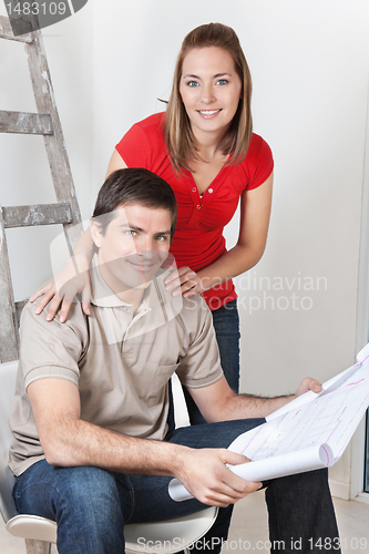 Image of Couple with Home Blueprints