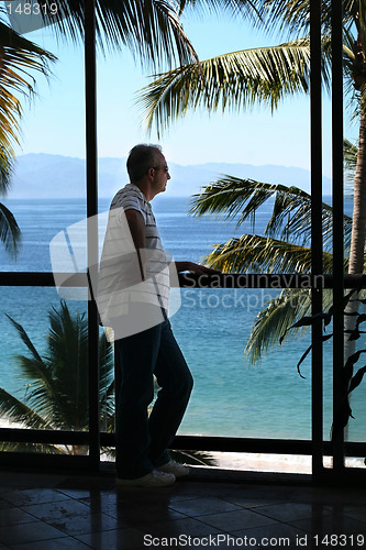 Image of Man by the window