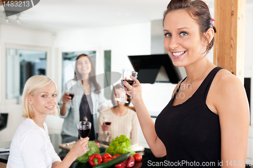 Image of Happy woman with glassat party