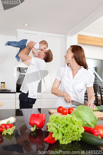 Image of Happy Family in Kitchen