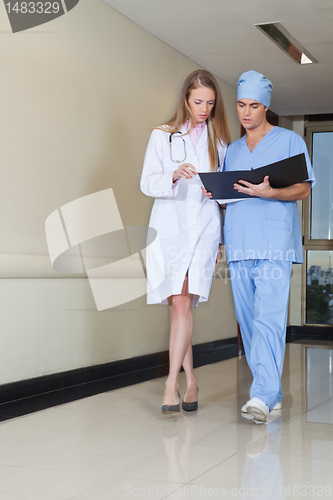 Image of Doctor and nurse with file