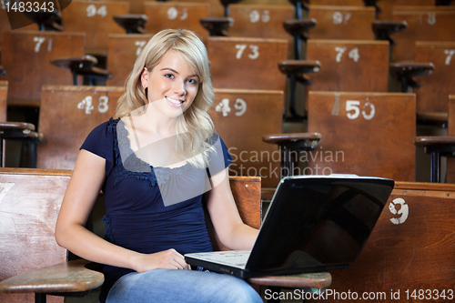 Image of College girl using laptop