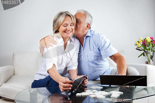 Image of Elderly Couple Playing Games