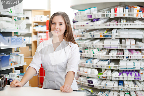 Image of Female Pharmacist Standing at Counter