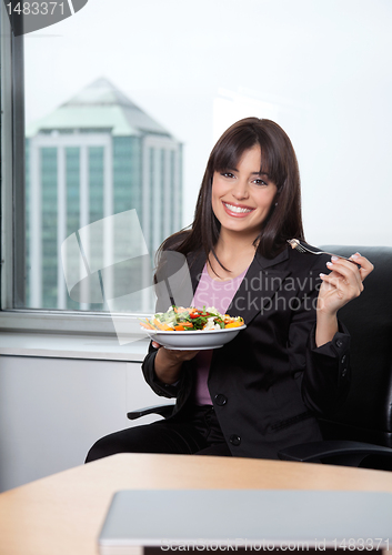 Image of Woman Having Fresh Salad of Vegetables