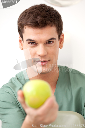 Image of Dentist with Apple