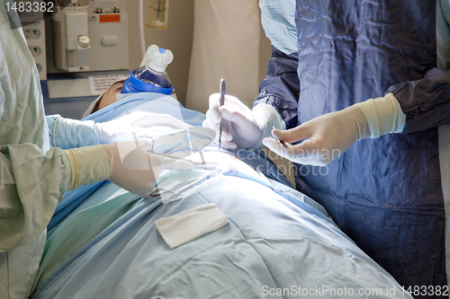 Image of Patient going through an operation
