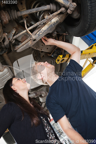 Image of Mechanic with Female Customer