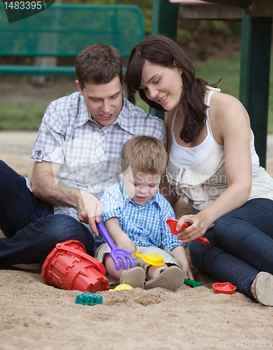 Image of Parents Playing With Their Son