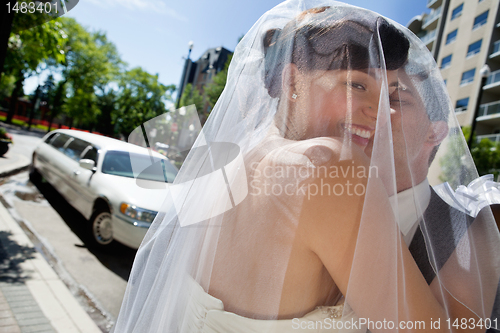 Image of Man Kissing His Wife