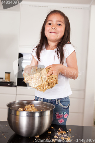 Image of Little Girl Making Cookies