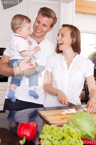 Image of Family Laughing in Kitchen