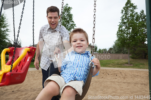 Image of Father and Son in Playground