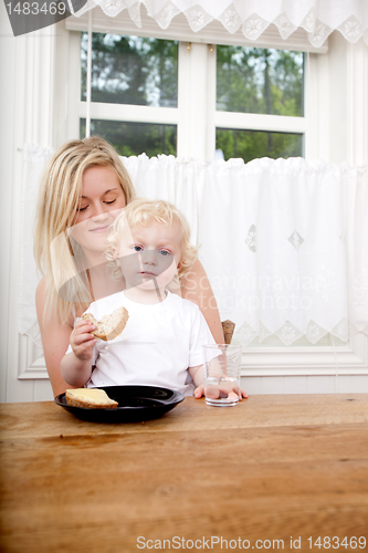 Image of Mother and Son Eating Lunch