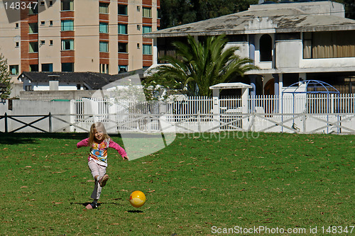 Image of the girl plays football