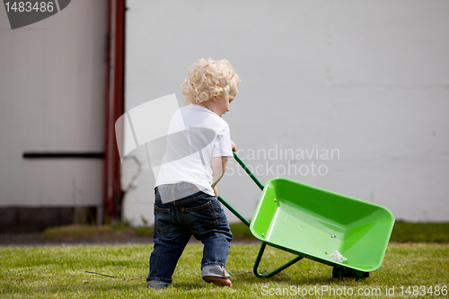 Image of Child with Wheelbarrow