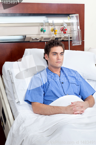 Image of Patient sitting on bed