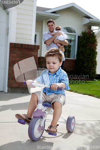 Image of Toddler Riding Bicycle