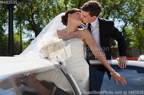 Image of Wedding Couple Kiss