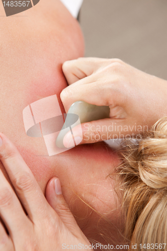 Image of Gua Sha Acupressure Treatment