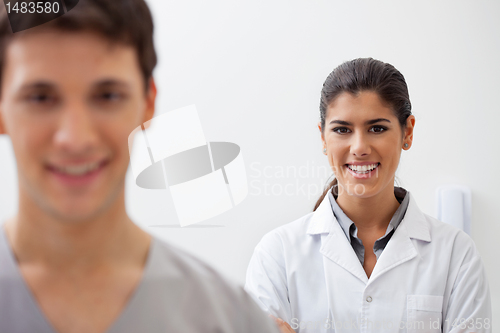 Image of Confident female doctor smiling