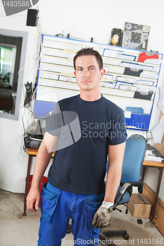 Image of Mechanic in Office