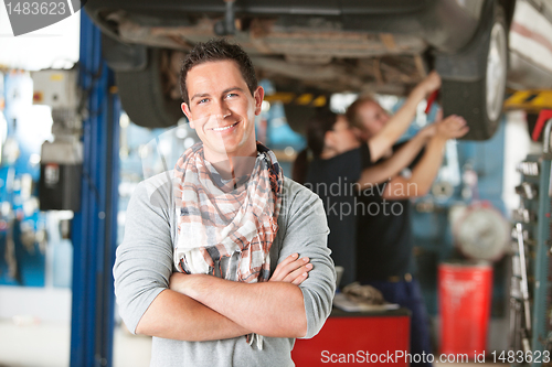 Image of Happy Customer in Auto RepairShop