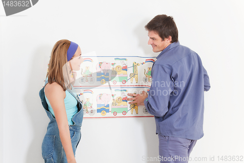 Image of Happy Couple Hanging Wallpaper