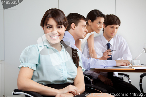 Image of Cute Businesswoman Smiling