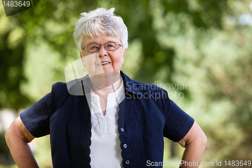 Image of Portrait of confident senior woman