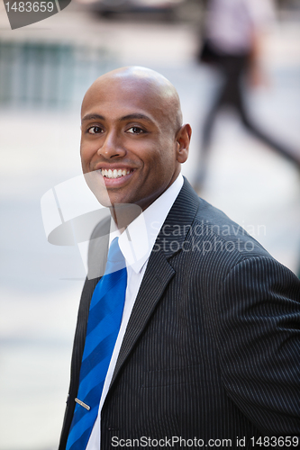 Image of Portrait of a smiling businessman