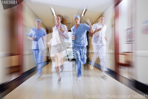 Image of Surgeon and nurse running