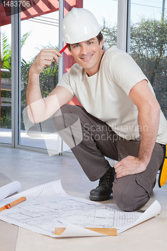 Image of Smart young construction worker