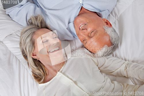 Image of Couple Lying in Bed