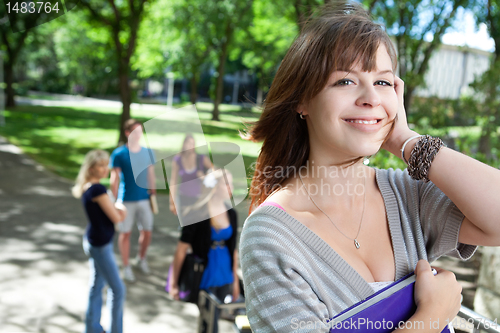 Image of Young college girl smiling