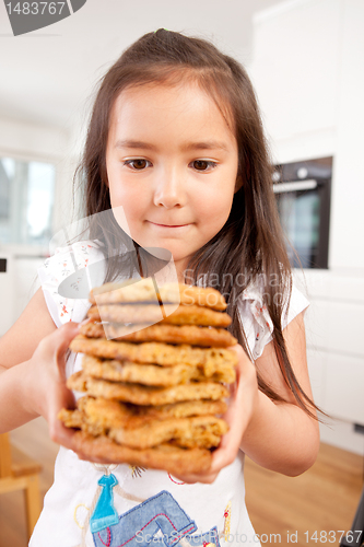 Image of Young Girl with Homemade Cookies