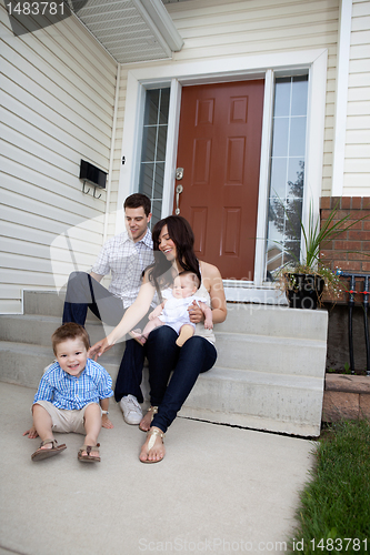 Image of Family Sitting on Steps