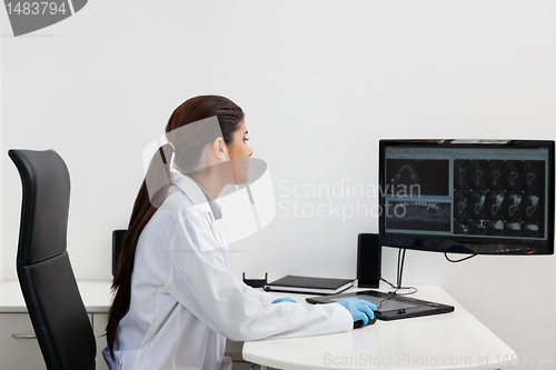 Image of Dentist working on computer