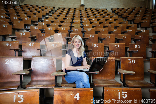 Image of Woman Student in Empty Lecture Hall