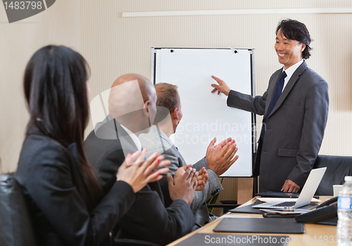 Image of Giving applause at business conference