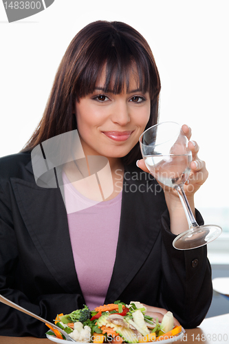 Image of Smiling Businesswoman Having Glass of Water