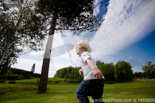 Image of Child Running Outdoors