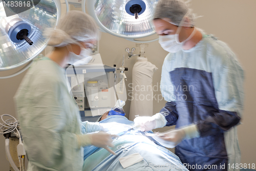 Image of Medical doctor performing an operation