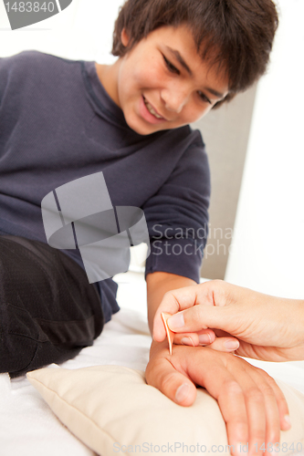 Image of Shonishin Acupuncture with Yoneyama Tool