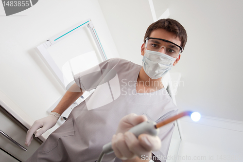 Image of Dentist with medical equipment